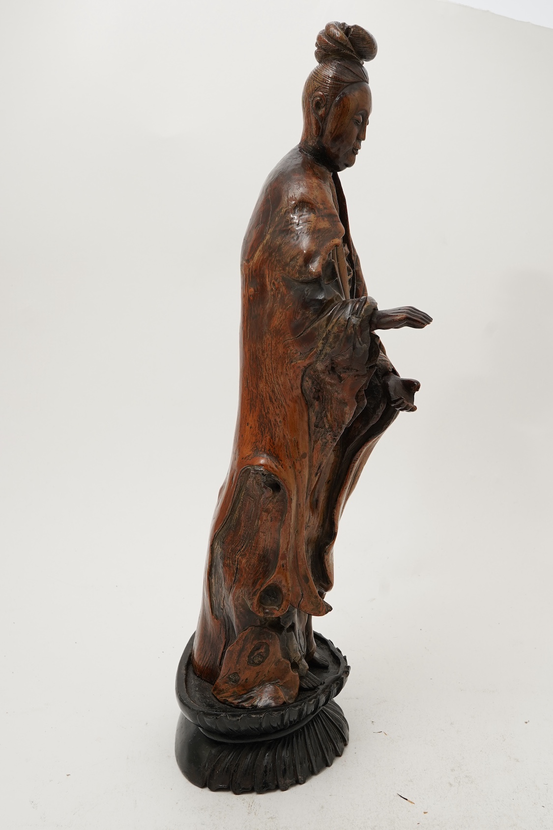 A Chinese rootwood standing figure of Guanyin, 18th/19th century